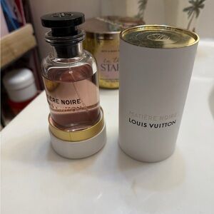 Louis Vuitton Matière Noire Perfume with Pink Hue